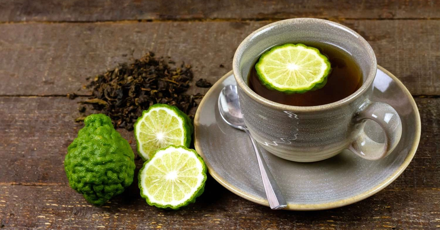 Cup of Earl Grey tea with bergamot and loose tea leaves